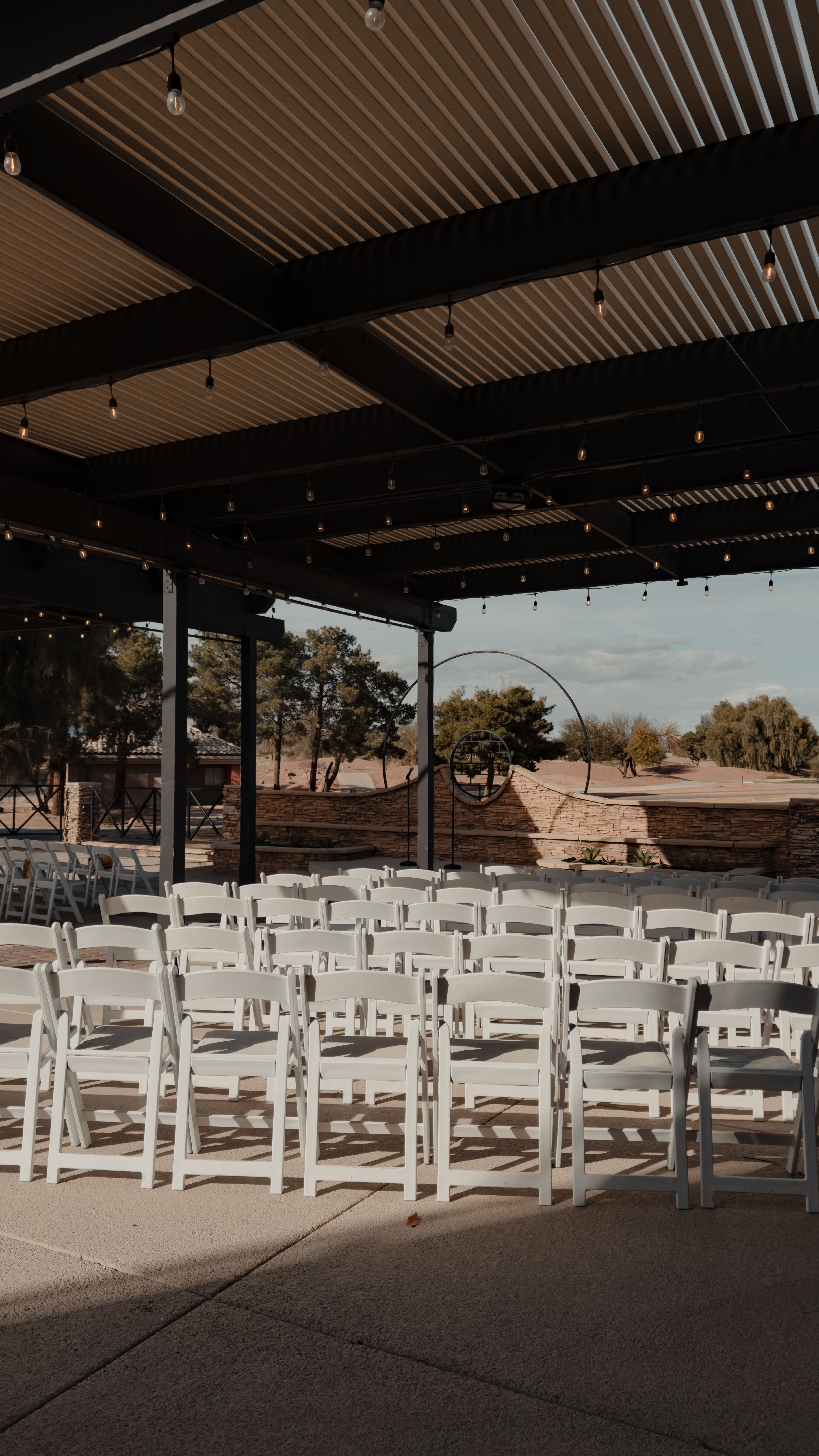 Patio string lights strung above an outdoor event space